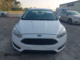 2016 Ford Focus SE z VIN 1FADP3F22GL355984, wystawiony jako IAAI lot #42564516 z przebiegiem 128 002 mil mil oraz . Historia ofert i sprzedaży dostępna na DreamBid. Obrazek 6.