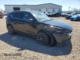 2018 Mazda CX-5 Grand Touring with VIN JM3KFBDM0J0434704, listed as a Copart auction lot 53732715 with Not Provided miles and Salvage Title. Bid and sale history available at DreamBid. Image 4.