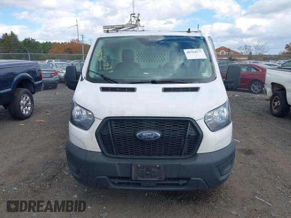 2022 Ford Transit Cargo with VIN 1FTBR1YG6NKA84259, listed as a IAAI auction lot 40764177 with 80,042 mi miles and . Bid and sale history available at DreamBid. Image 12.