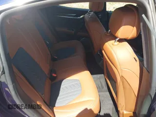 2019 Maserati Ghibli S Q4 GranLusso z VIN ZAM57YTLXK1338200, wystawiony jako IAAI lot #41875692 z przebiegiem 31 254 mil mil oraz . Historia ofert i sprzedaży dostępna na DreamBid. Obrazek 8.