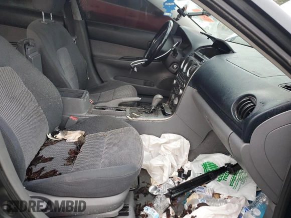 2004 Mazda 6 i with VIN 1YVFP80C045N12892, listed as a Copart auction lot 86513924 with 230,683 mi miles and Salvage Title. Bid and sale history available at DreamBid. Image 7.