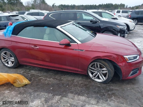 2019 Audi A5 Cabriolet Premium Plus with VIN WAUYNGF56KN002340, listed as a IAAI auction lot 41521638 with 69,381 mi miles. Bid and sale history available at carsss.com. Image 13.