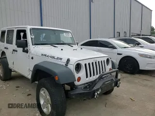 2013 Jeep Wrangler Unlimited Sport z VIN 1C4BJWDG0DL574795, wystawiony jako Copart lot #59230515 z przebiegiem 132 808 mil mil oraz Szkoda całkowita • Salvage title. Historia ofert i sprzedaży dostępna na DreamBid. Obrazek 14.