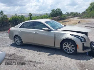2014 Cadillac CTS Luxury RWD z VIN 1G6AR5SX4E0141195, wystawiony jako IAAI lot #42144565 z przebiegiem 80 267 mil mil oraz . Historia ofert i sprzedaży dostępna na DreamBid. Obrazek 12.