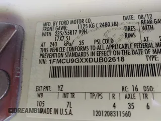 2013 Ford Escape SE with VIN 1FMCU9GXXDUB02618, listed as a IAAI auction lot 41734363 with 198,264 mi miles. Bid and sale history available at carsss.com. Image 9.