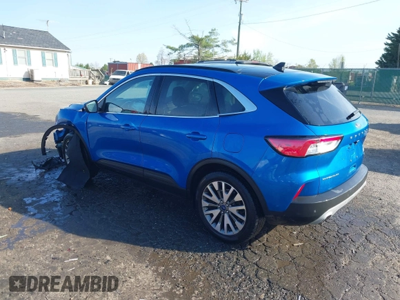 2020 Ford Escape Titanium Hybrid with VIN 1FMCU9DZ1LUB59214, listed as a IAAI auction lot 42050336 with 59,547 mi miles and . Bid and sale history available at DreamBid. Image 3.
