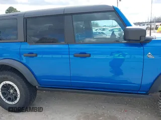 2023 Ford Bronco z VIN 1FMEE5DH6PLB09202, wystawiony jako IAAI lot #41059734 z przebiegiem 30 186 mil mil oraz . Historia ofert i sprzedaży dostępna na DreamBid. Obrazek 13.