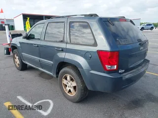 2007 Jeep Grand Cherokee Laredo with VIN 1J8GS48K17C684497, listed as a IAAI auction lot 42136314 with 155,024 mi miles. Bid and sale history available at carsss.com. Image 3.