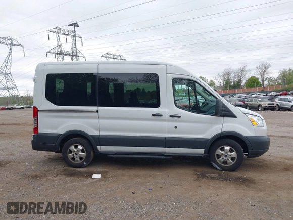 2017 Ford Transit Passenger XL z VIN 1FMZK1CM8HKA67270, wystawiony jako IAAI lot #42074459 z przebiegiem 50 461 mil mil oraz . Historia ofert i sprzedaży dostępna na DreamBid. Obrazek 14.