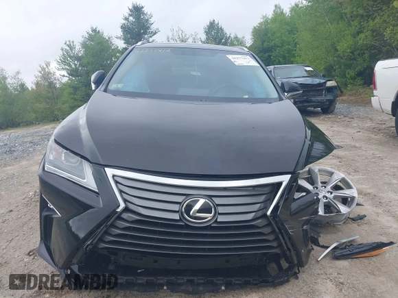 2016 Lexus RX 350 with VIN 2T2BZMCA6GC015849, listed as a IAAI auction lot 42277413 with 63,927 mi miles and . Bid and sale history available at DreamBid. Image 13.