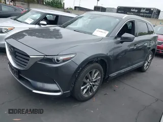 2018 Mazda CX-9 Grand Touring with VIN JM3TCBDY1J0200183, listed as a IAAI auction lot 42408132 with 69,023 mi miles and . Bid and sale history available at DreamBid. Image 2.