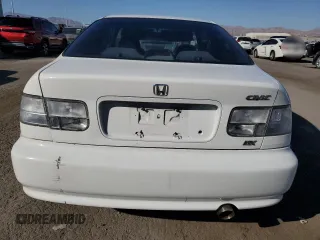 2000 Honda Civic DX z VIN 1HGEJ6225YL080394, wystawiony jako Copart lot #73515634 z przebiegiem 141 139 mil mil oraz Szkoda całkowita • Salvage title. Historia ofert i sprzedaży dostępna na DreamBid. Obrazek 6.