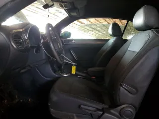 2016 Volkswagen Beetle Denim с VIN 3VW507AT8GM802601, выставлен на аукционе Copart как лот 60335415 с пробегом 71 163 миль миль и Списание • Salvage title. История ставок и продаж доступна на DreamBid. Изображение 7.