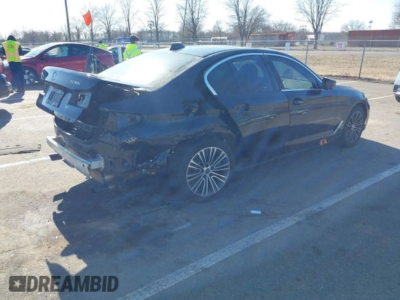 2019 BMW 5 Series 530i xDrive with VIN WBAJA7C50KG910787, listed as a IAAI auction lot 41761104 with 65,018 mi miles. Bid and sale history available at carsss.com. Image 4.