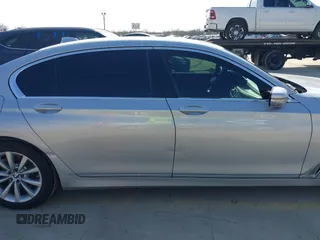 2016 BMW 7 Series 740i with VIN WBA7E2C5XGG739099, listed as a IAAI auction lot 41526038 with 123,900 mi miles. Bid and sale history available at carsss.com. Image 13.
