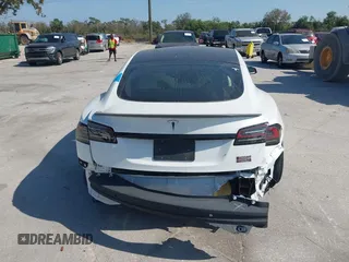 2022 Tesla Model S Plaid with VIN 5YJSA1E64NF484904, listed as a IAAI auction lot 41594464 with 25,299 mi miles and . Bid and sale history available at DreamBid. Image 15.