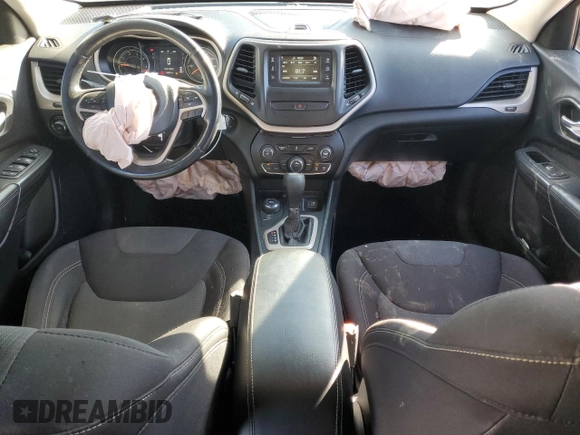 2015 Jeep Cherokee Latitude with VIN 1C4PJMCB9FW709077, listed as a Copart auction lot 76240454 with 104,882 mi miles and Salvage Title. Bid and sale history available at DreamBid. Image 8.