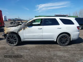 2019 Dodge Durango GT Plus with VIN 1C4RDJDG6KC561006, listed as a IAAI auction lot 41819583 with 53,395 mi miles and . Bid and sale history available at DreamBid. Image 13.