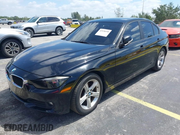 2014 BMW 3 Series 320i with VIN WBA3B1C55EK135357, listed as a IAAI auction lot 42158550 with 148,911 mi miles. Bid and sale history available at carsss.com. Image 2.