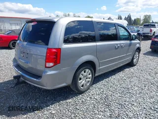 2016 Dodge Grand Caravan SE with VIN 2C4RDGBGXGR220549, listed as a IAAI auction lot 42074110 with 114,826 mi miles and . Bid and sale history available at DreamBid. Image 4.