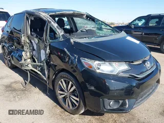 2015 Honda Fit EX-L z VIN 3HGGK5H81FM705199, wystawiony jako IAAI lot #42310099 z przebiegiem Nie podano mil oraz . Historia ofert i sprzedaży dostępna na DreamBid. Obrazek 1.