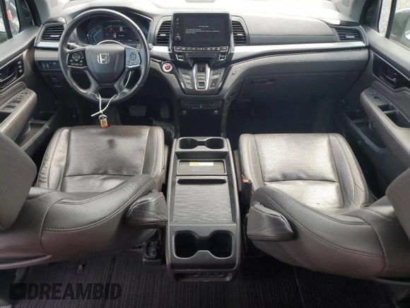2019 Honda Odyssey Touring z VIN 5FNRL6H80KB501681, wystawiony jako Copart lot #58814945 z przebiegiem 105 287 mil mil oraz Szkoda całkowita • Salvage title. Historia ofert i sprzedaży dostępna na DreamBid. Obrazek 8.