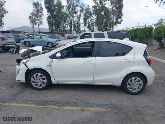 2015 Toyota Prius c One with VIN JTDKDTB3XF1097538, listed as a IAAI auction lot 42031057 with 100,847 mi miles. Bid and sale history available at carsss.com. Image 14.