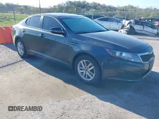 2011 Kia Optima LX z VIN KNAGM4A78B5160961, wystawiony jako IAAI lot #42001336 z przebiegiem 168 906 mil mil oraz . Historia ofert i sprzedaży dostępna na DreamBid. Obrazek 1.