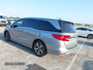 2023 Honda Odyssey Touring with VIN 5FNRL6H86PB020700, listed as a IAAI auction lot 41961098 with 66,512 mi miles and . Bid and sale history available at DreamBid. Image 3.