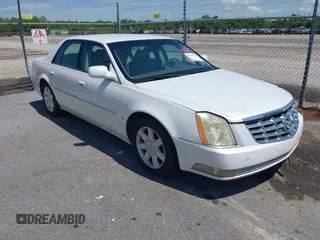 2006 Cadillac DTS 1SD z VIN 1G6KD57Y06U208812, wystawiony jako IAAI lot #42233924 z przebiegiem 120 244 mil mil oraz . Historia ofert i sprzedaży dostępna na DreamBid. Obrazek 1.