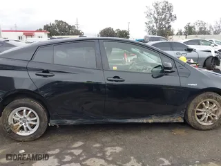 2019 Toyota Prius L Eco with VIN JTDKARFU6K3074058, listed as a IAAI auction lot 41741499 with 70,834 mi miles. Bid and sale history available at carsss.com. Image 13.
