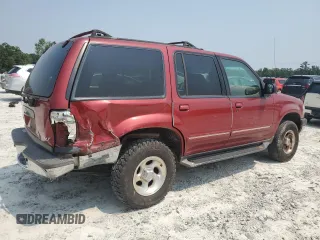 2000 Ford Explorer XLT with VIN 1FMZU73E4YZA72348, listed as a Copart auction lot 59015585 with 182,606 mi miles and Salvage title. Bid and sale history available at DreamBid. Image 3.