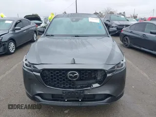 2022 Mazda CX-5 2.5 Turbo with VIN JM3KFBAY8N0647204, listed as a IAAI auction lot 41567490 with 40,396 mi miles and . Bid and sale history available at carsss.com. Image 12.