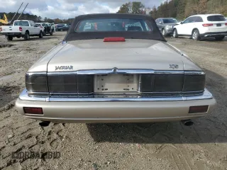 1996 Jaguar XJS with VIN SAJNX2742TC224462, listed as a Copart auction lot 79755744 with 120,724 mi miles and Salvage Title. Bid and sale history available at carsss.com. Image 6.