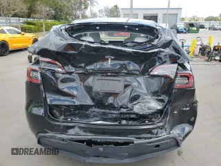 2023 Tesla Model Y Performance with VIN 7SAYGDEF8PF762915, listed as a Copart auction lot 50270285 with 23,893 mi miles and Salvage Title. Bid and sale history available at DreamBid. Image 6.