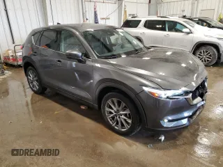 2021 Mazda CX-5 Grand Touring with VIN JM3KFBDM6M0478372, listed as a Copart auction lot 43797295 with 31,763 mi miles and Salvage Title. Bid and sale history available at carsss.com. Image 4.