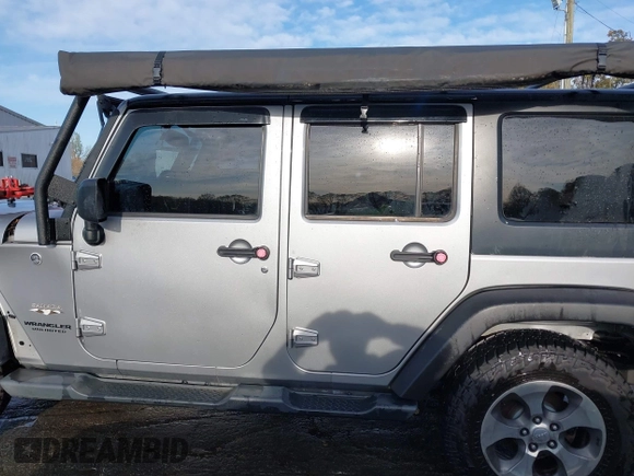 2016 Jeep Wrangler Unlimited 75th Anniversary with VIN 1C4HJWEGXGL149548, listed as a IAAI auction lot 41918007 with 254,655 mi miles. Bid and sale history available at carsss.com. Image 13.