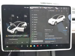 2021 Tesla Model Y Long Range with VIN 5YJYGDEE6MF122363, listed as a IAAI auction lot 41952018 with 54,263 mi miles and . Bid and sale history available at carsss.com. Image 18.