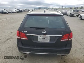 2015 Mercedes-Benz E 350 Luxury with VIN WDDHH8JB0FB083412, listed as a Copart auction lot 52053855 with 117,040 mi miles and Salvage title. Bid and sale history available at DreamBid. Image 6.