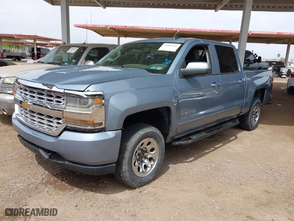 2016 Chevrolet Silverado 1500 LT with VIN 3GCUKREC6GG201295, listed as a IAAI auction lot 41862581 with 134,132 mi miles. Bid and sale history available at carsss.com. Image 2.