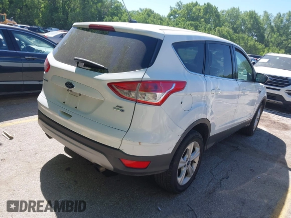 2016 Ford Escape SE z VIN 1FMCU9GX1GUC67851, wystawiony jako IAAI lot #42283011 z przebiegiem 134 458 mil mil oraz . Historia ofert i sprzedaży dostępna na DreamBid. Obrazek 4.