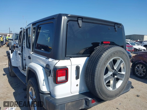 2019 Jeep Wrangler Unlimited Sahara with VIN 1C4HJXEG0KW577917, listed as a IAAI auction lot 41993670 with 90,584 mi miles and . Bid and sale history available at DreamBid. Image 3.