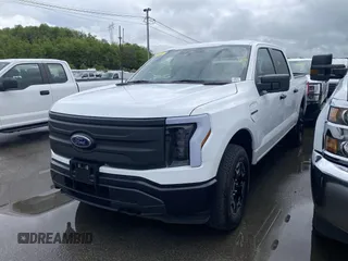 2022 Ford F-150 Lightning Pro z VIN 1FTVW1ELXNWG14877, wystawiony jako IAAI lot #42307128 z przebiegiem 10 264 mil mil oraz . Historia ofert i sprzedaży dostępna na DreamBid. Obrazek 1.