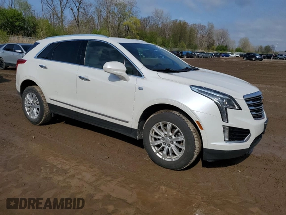 2017 Cadillac XT5 FWD with VIN 1GYKNARS0HZ157551, listed as a Copart auction lot 55281725 with 144,077 mi miles and Clean title. Bid and sale history available at DreamBid. Image 4.