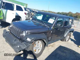2020 Jeep Wrangler Unlimited Sport S with VIN 1C4HJXDG1LW237405, listed as a IAAI auction lot 40631451 with 60,256 mi miles and . Bid and sale history available at DreamBid. Image 17.