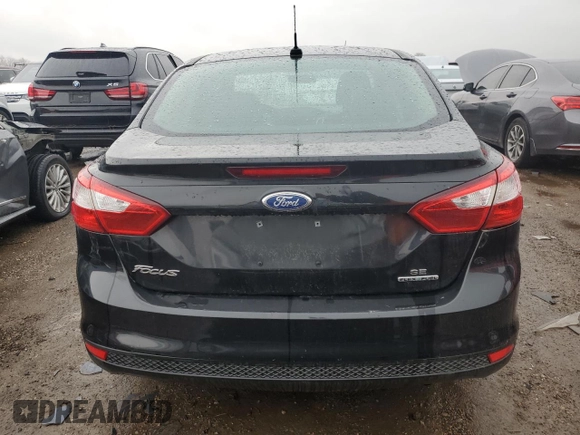 2013 Ford Focus SE z VIN 1FADP3F21DL306223, wystawiony jako Copart lot #51498105 z przebiegiem 135 627 mil mil oraz Szkoda całkowita • Salvage title. Historia ofert i sprzedaży dostępna na DreamBid. Obrazek 6.