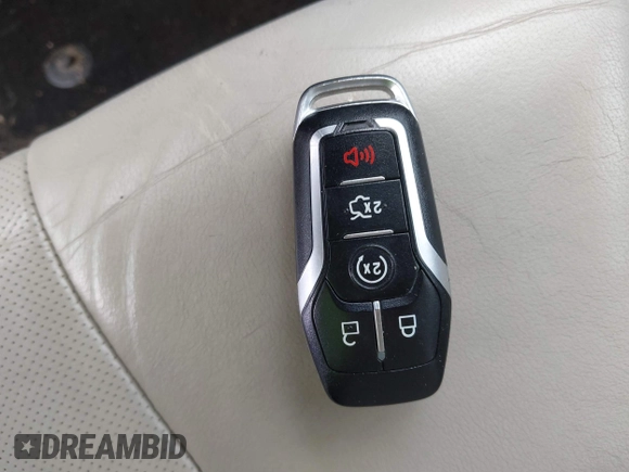 2016 Ford Fusion Titanium with VIN 3FA6P0SU5GR287017, listed as a IAAI auction lot 42316622 with 97,000 mi miles and . Bid and sale history available at DreamBid. Image 11.