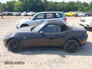 2021 Mazda MX-5 Miata Sport with VIN JM1NDAB73M0454064, listed as a IAAI auction lot 42613537 with 24,630 mi miles and . Bid and sale history available at DreamBid. Image 14.