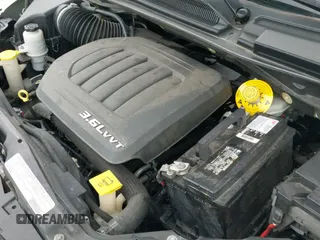 2018 Dodge Grand Caravan SE z VIN 2C4RDGBG0JR202794, wystawiony jako IAAI lot #42661539 z przebiegiem 125 361 mil mil oraz . Historia ofert i sprzedaży dostępna na DreamBid. Obrazek 21.