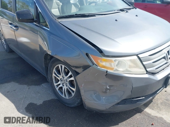 2011 Honda Odyssey EX-L with VIN 5FNRL5H69BB092752, listed as a IAAI auction lot 42245534 with 142,718 mi miles and . Bid and sale history available at DreamBid. Image 6.